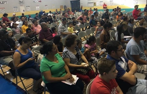 Parents listening to speakers at WatchDog Event