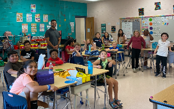 Mr. Sanmiguel with his students