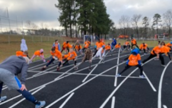 Students warm up before the 2020 Tiger Fitness 5K