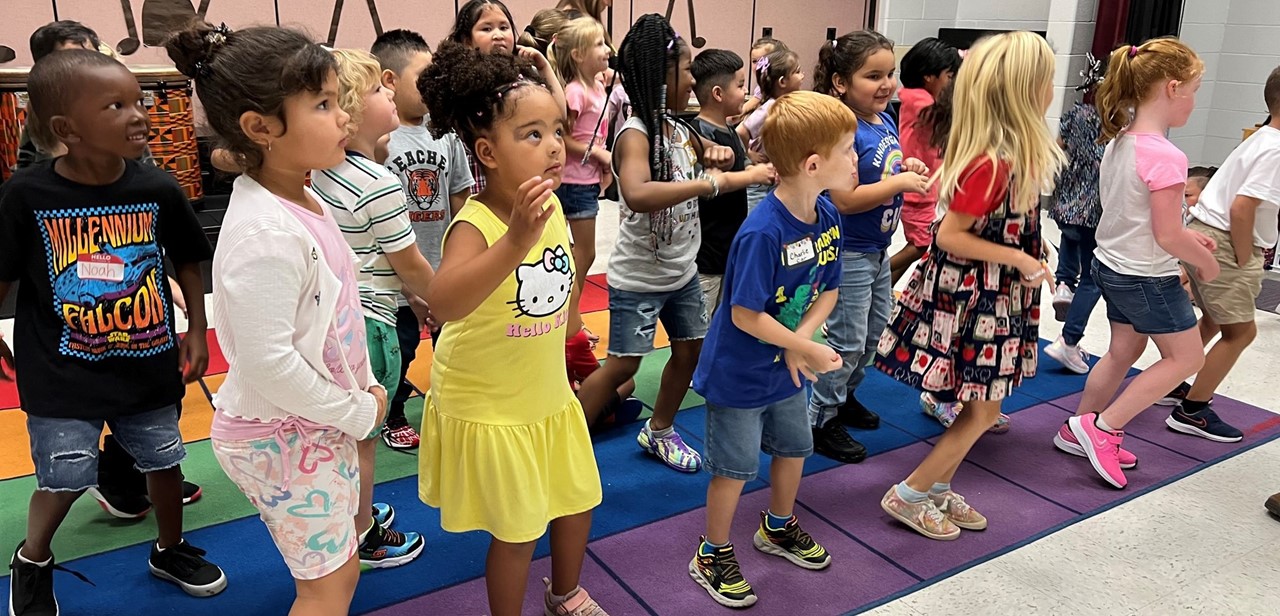 Kindergarten GBT Students Dance in Music Class